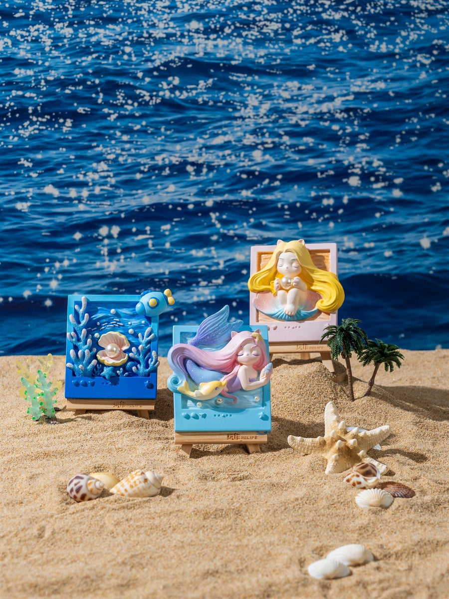 Ocean relief artworks displayed on miniature easels
