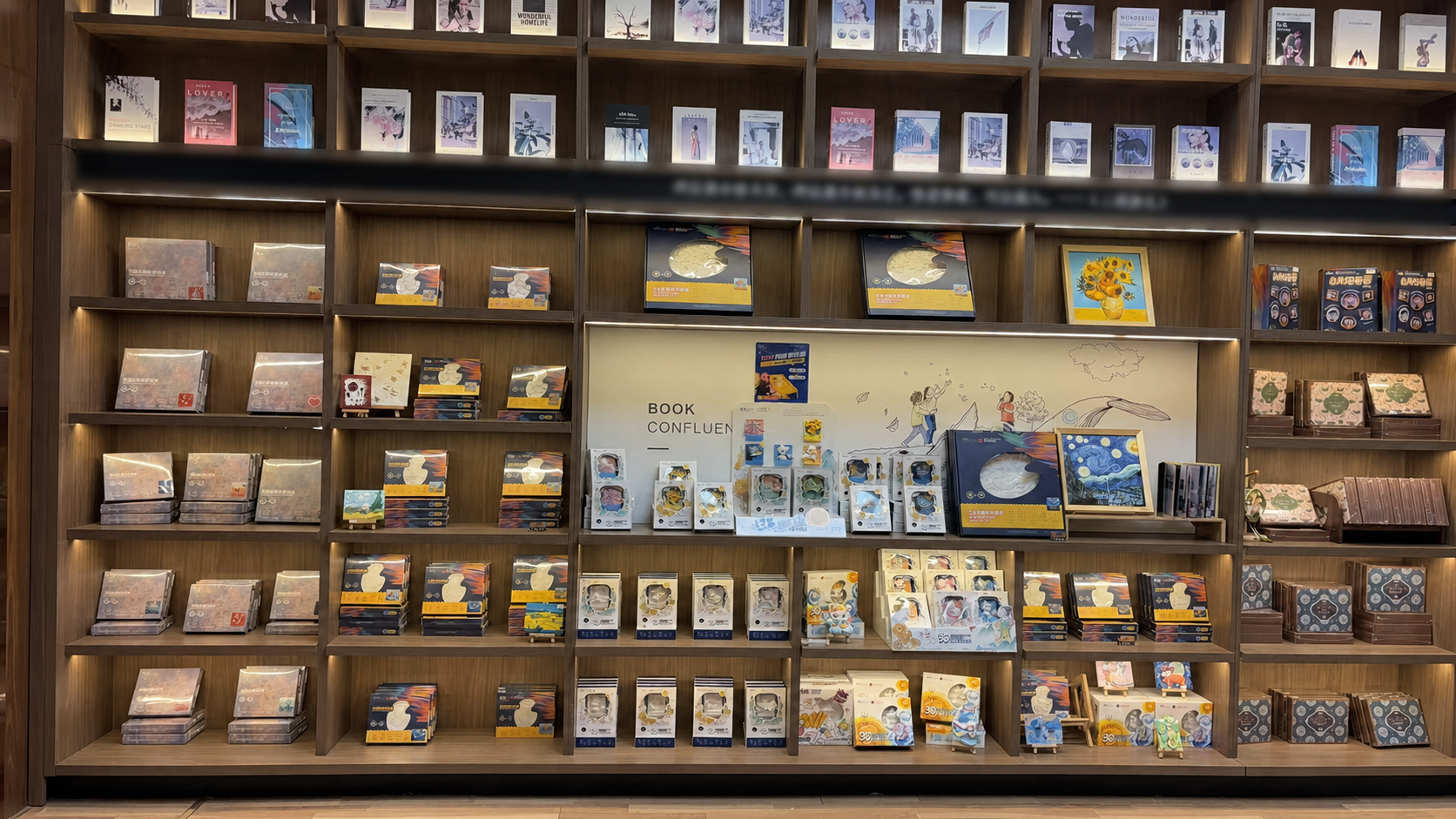 Relife DIY painting kits displayed across a bookstore wall